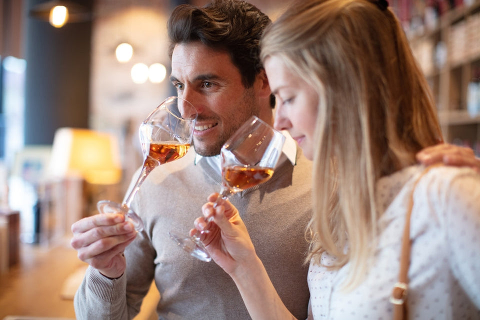 A couple finding out what does wine taste like